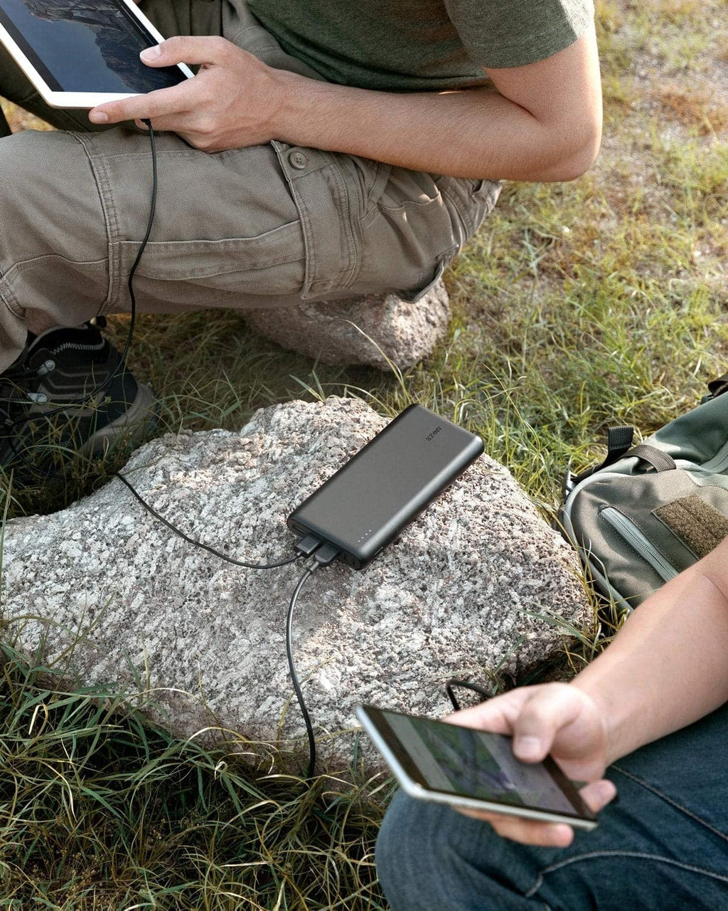 Anker with power bank charging two devices outdoors
